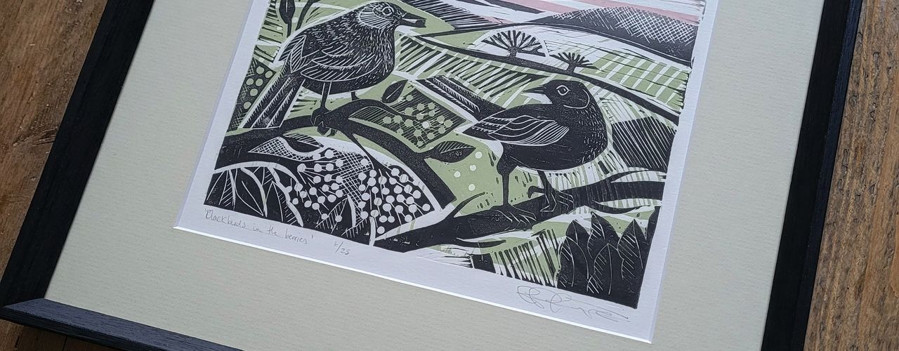 Blackbirds with berries