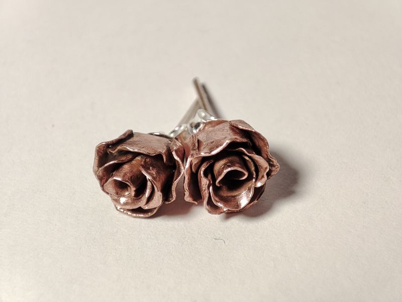Copper Rose studs, with silver posts.