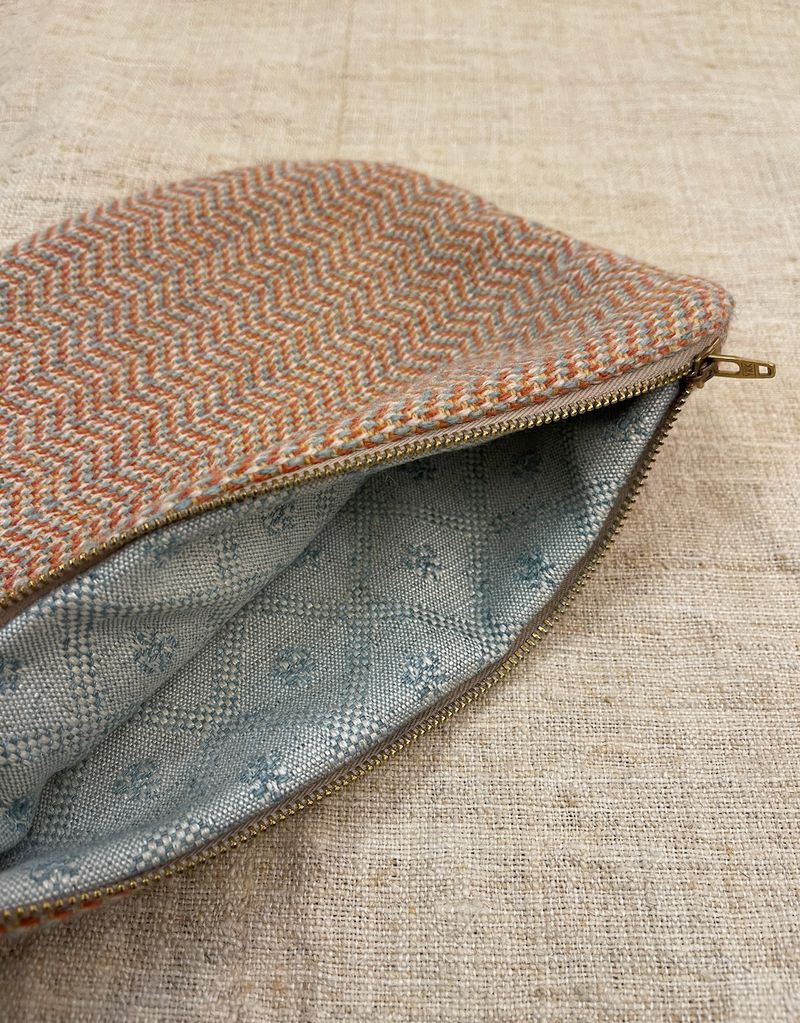 Woven purse with a surprise lining, sewn locally.