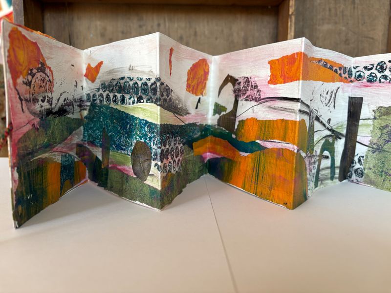 Concertina book with gelli print papers and other media