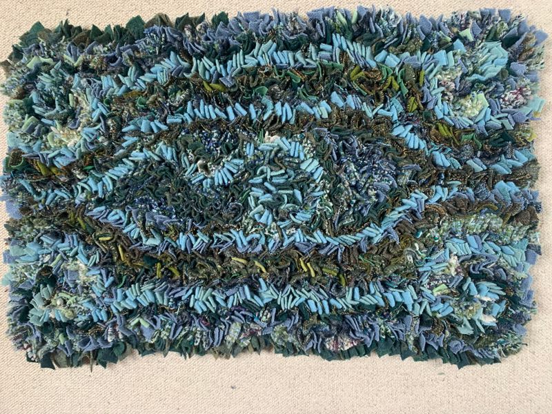 progged woollen rag rug