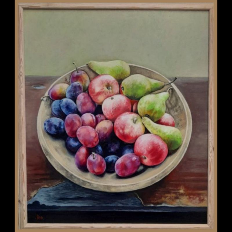 'Homegrown fruit in a wooden bowl '
