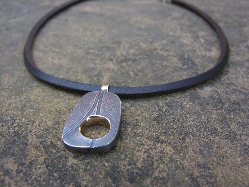 Silver & Gold Hagstone Pendant