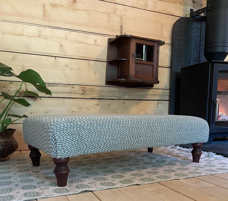 One of our handmade footstools, covered in rugwool woven fabric