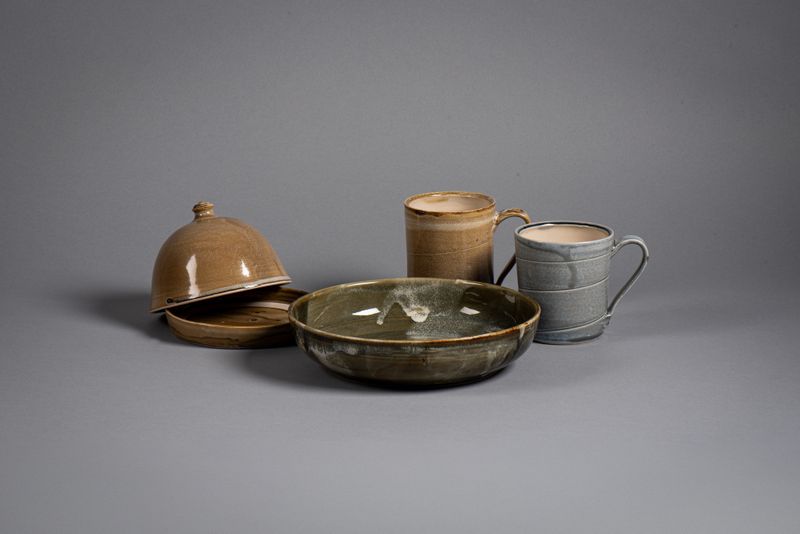 Stoneware butter dish, mugs and bowl