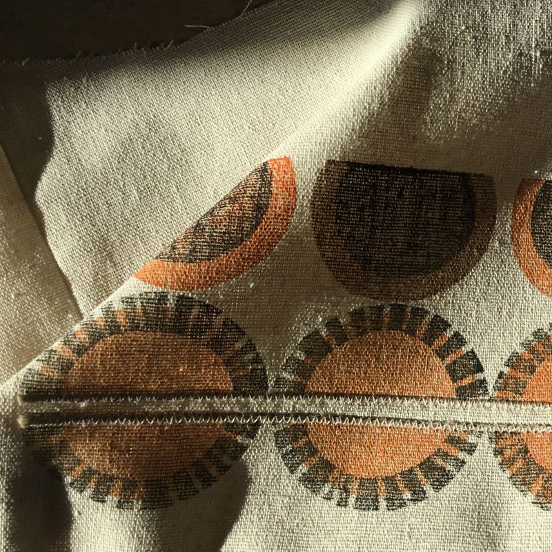 Block-printed cotton cloth with embellishment