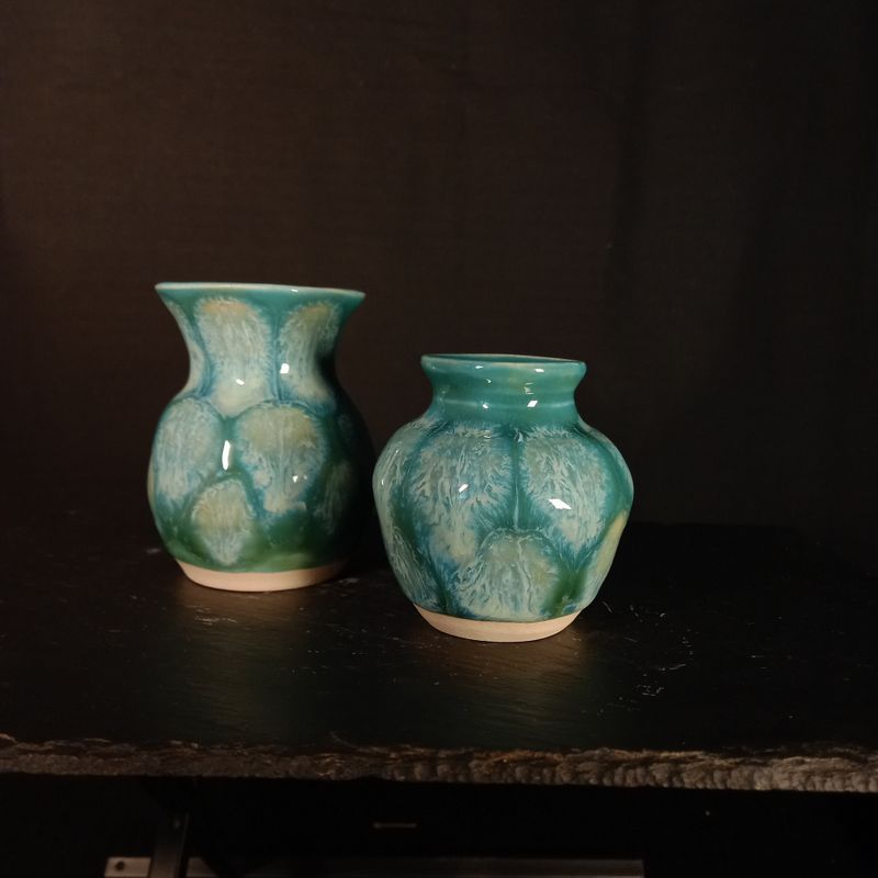Two green toned bud vases
