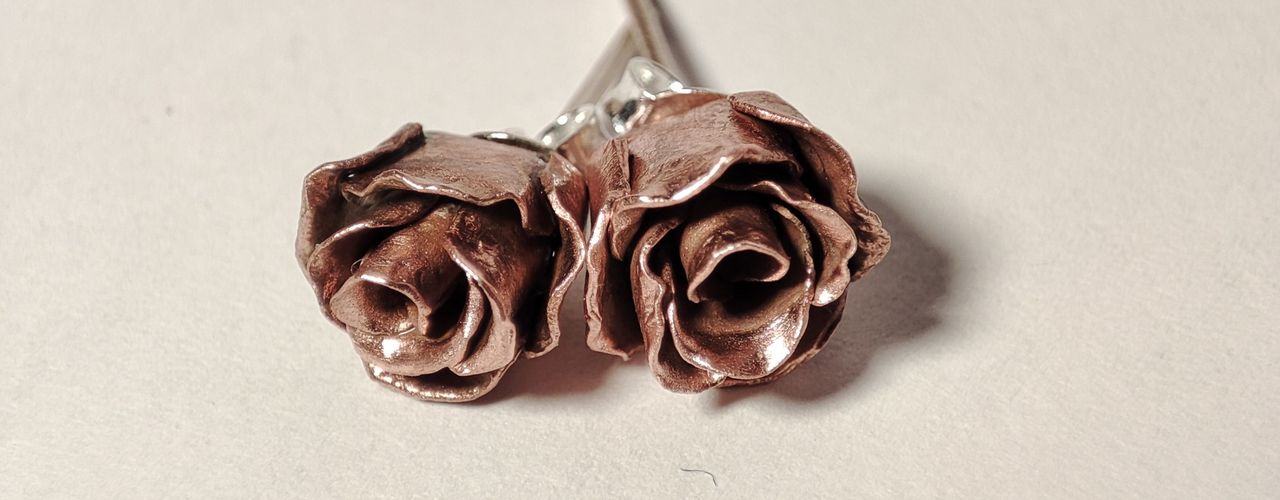 Copper Rose studs, with silver posts.