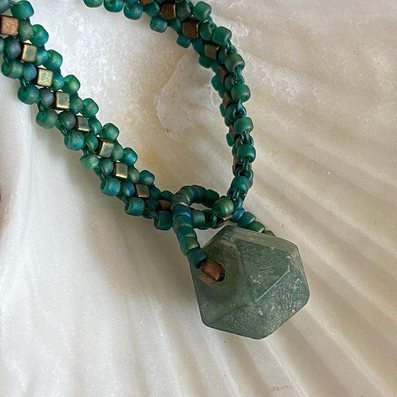 Matte Afghan Jade on a close-daisy chain strap